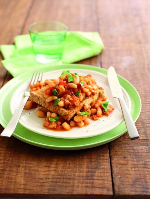 Homemade baked beans and ham on toast