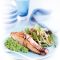 Honey-spiced salmon with wasabi pea mash and apple salad