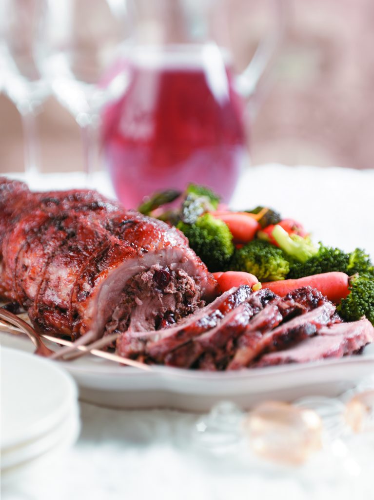 Maple-glazed pork with cranberry and pecan stuffing Maple-glazed pork with cranberry and pecan stuffing