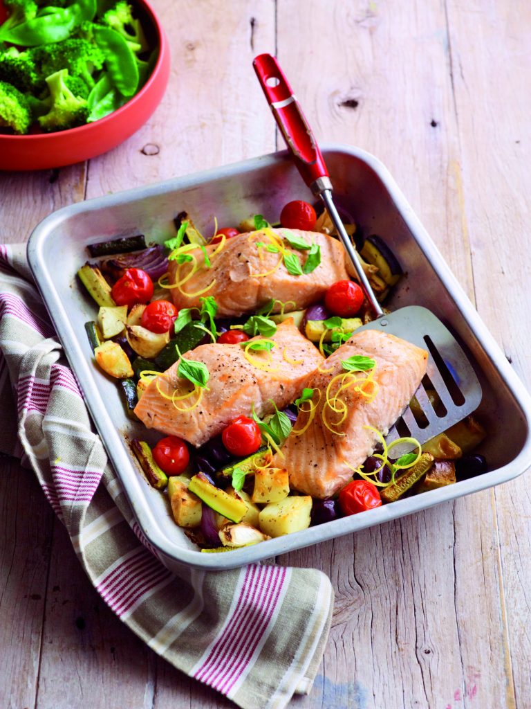 Oven-roasted salmon with oregano, lemon and tender veges Oven-roasted salmon with oregano, lemon and tender veges