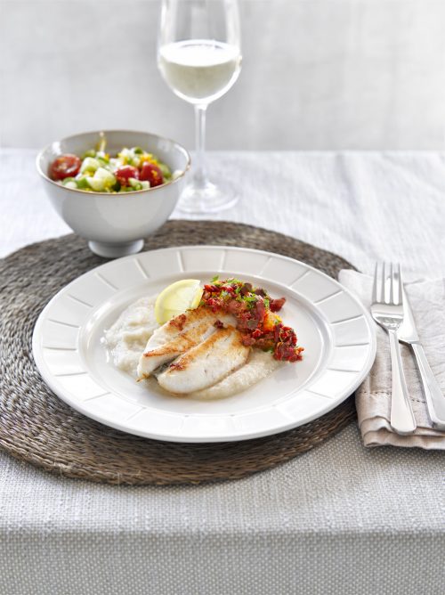 Pan-fried fish with cauliflower puree and citrus caper salsa