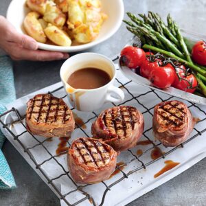 Prosciutto-wrapped mustard beef with crushed potatoes