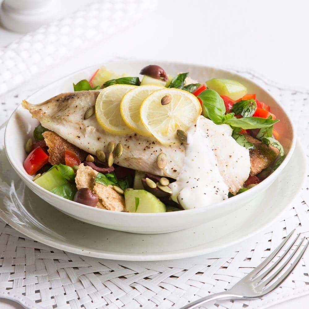 Quick lemon-roasted fish with tomato and olive salad Quick lemon-roasted fish with tomato and olive salad