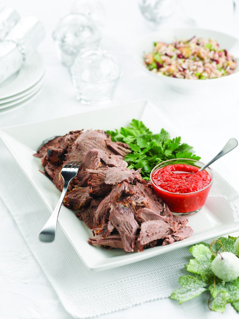 Rosemary-marinated lamb leg with roasted pepper relish