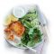 Salmon and kumara cakes with cucumber and avocado salad