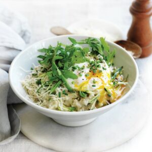 Savoury porridge with zucchini, parmesan, rocket and poached egg