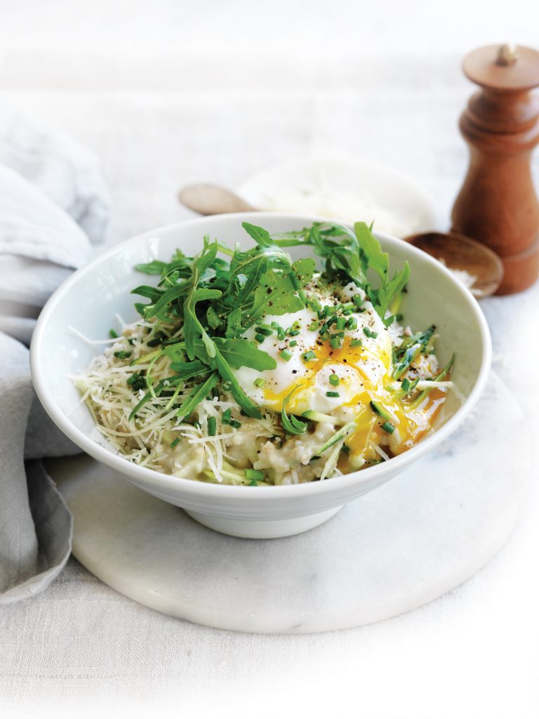 Savoury porridge with zucchini, parmesan, rocket and poached egg Savoury porridge with zucchini, parmesan, rocket and poached egg