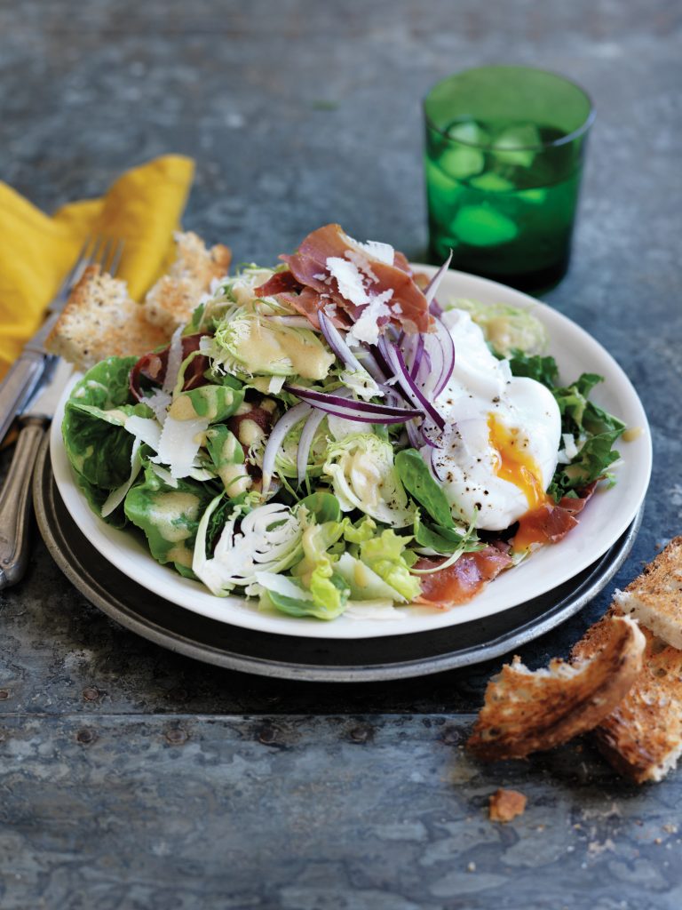 Shaved Brussels sprout salad with prosciutto and poached eggs Shaved Brussels sprout salad with prosciutto and poached eggs