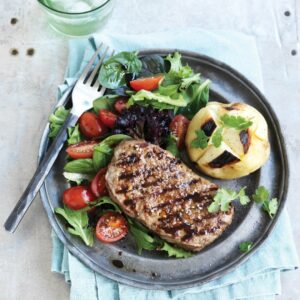 Spice-rubbed steak with baked potatoes