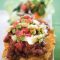 Spicy bean nachos with avocado salsa and salad