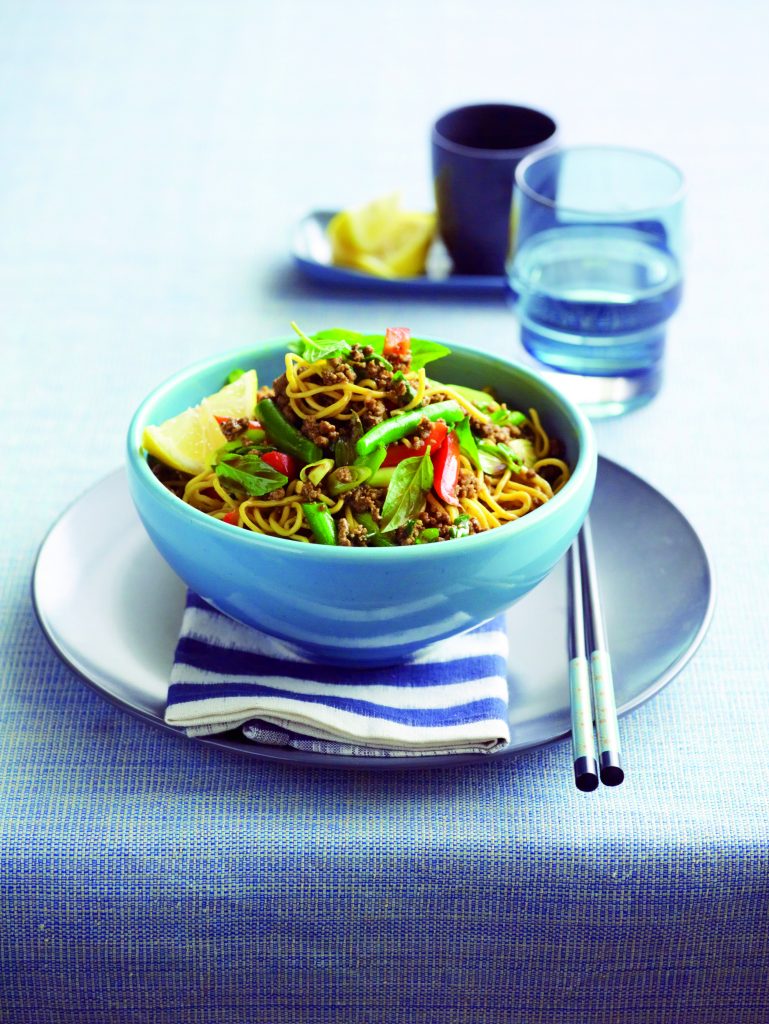 Stir-fried curried beef with noodles and basil Stir-fried curried beef with noodles and basil