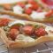 Tomato and pine nut tarts