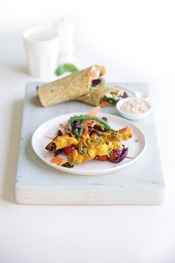 Turmeric and herb chicken kebabs with spinach wraps
