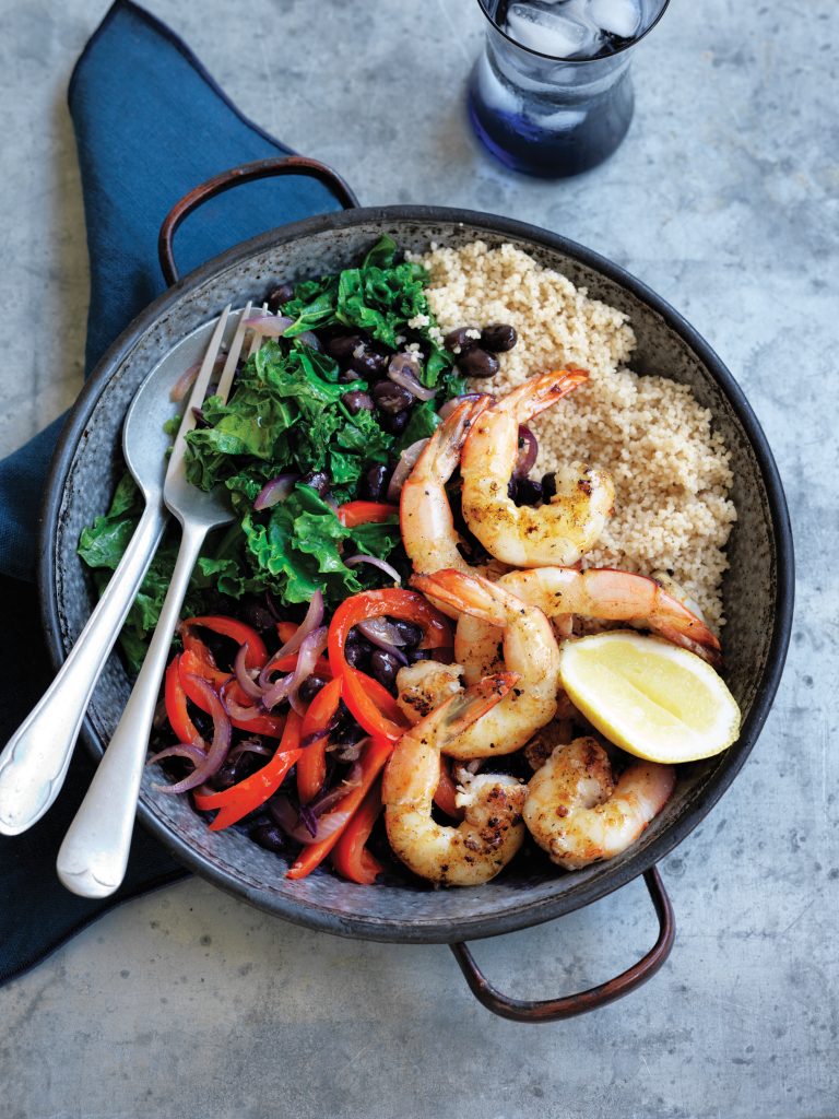 Warm black bean and kale couscous with grilled prawns Warm black bean and kale couscous with grilled prawns