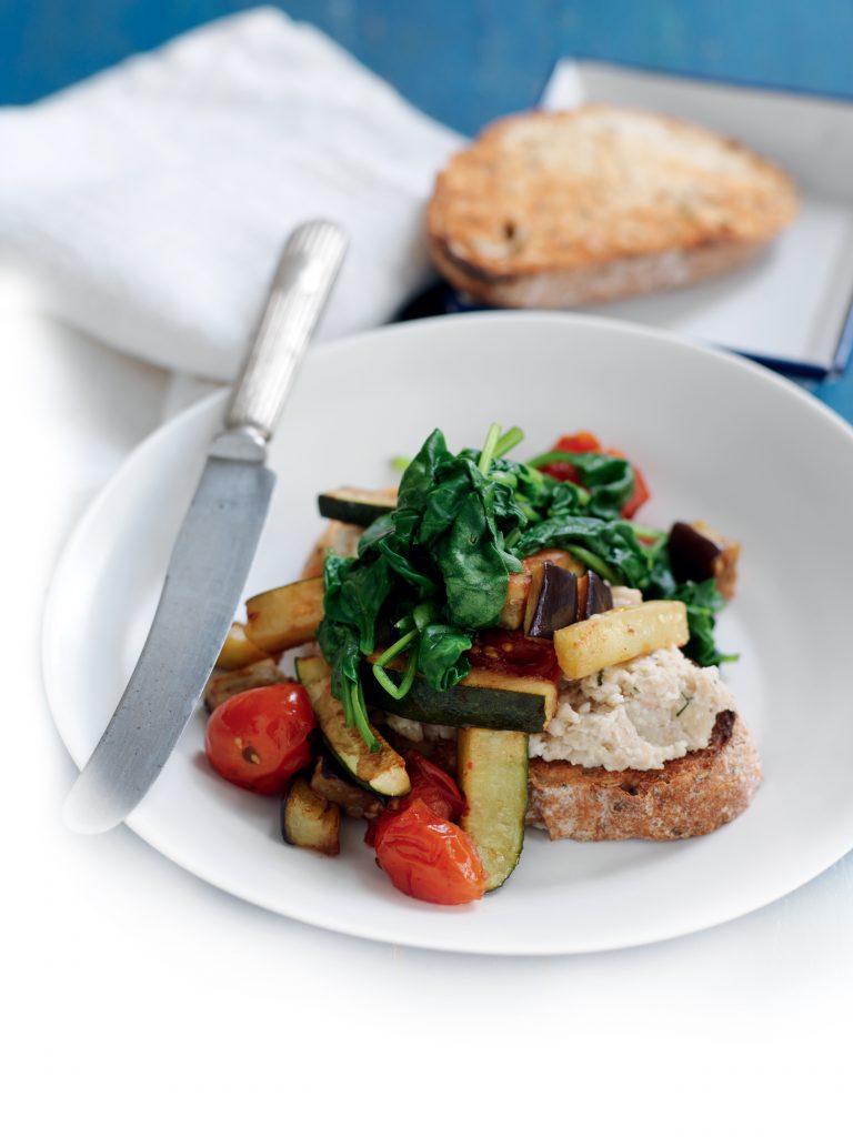 White bean mash with wilted spinach, courgette and tomato White bean mash with wilted spinach, courgette and tomato