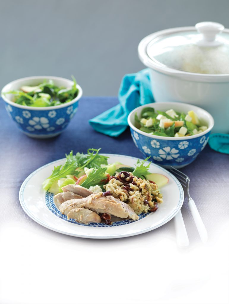 Whole slow-cooked chicken stuffed with cranberry and almond couscous Whole slow-cooked chicken stuffed with cranberry and almond couscous