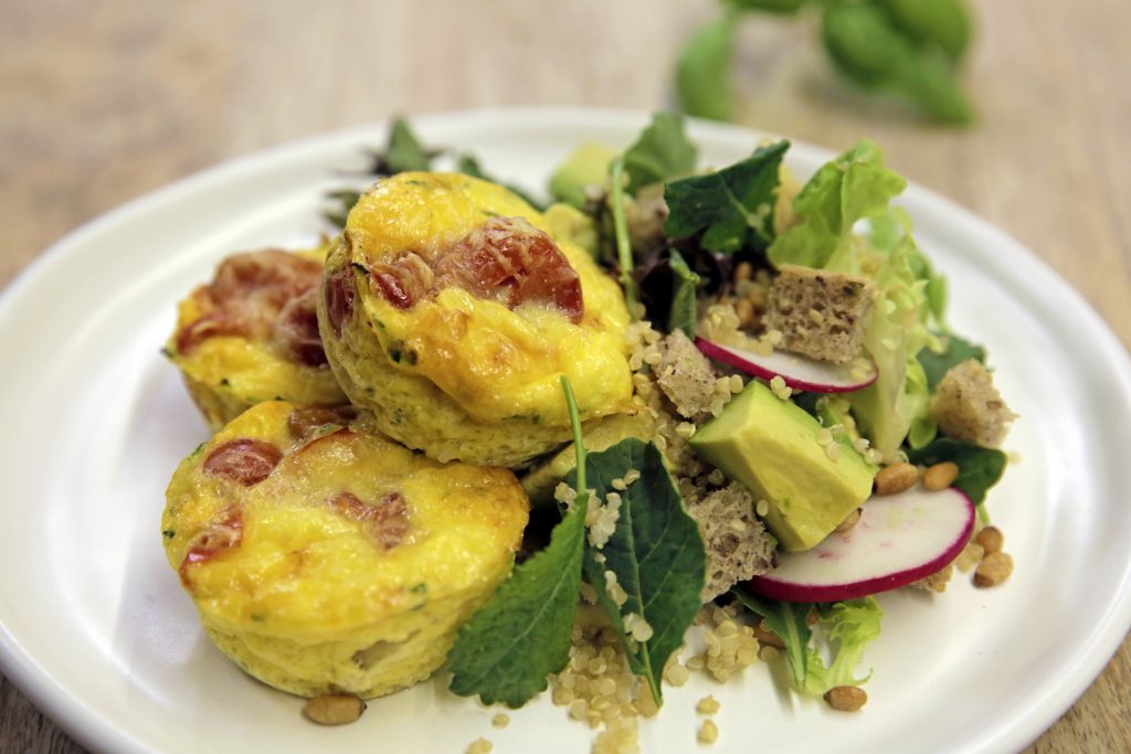Courgette and tomato frittatas with avocado, quinoa and radish salad Courgette and tomato frittatas with avocado, quinoa and radish salad