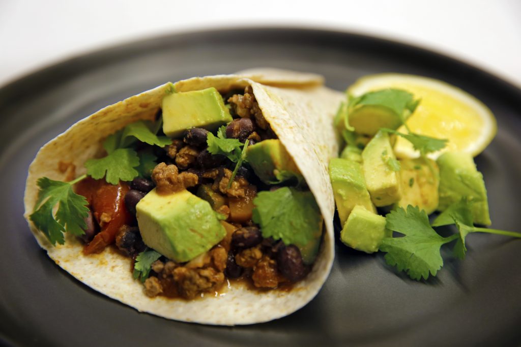 Mexican black beans with spicy avocado and grilled tortilla Mexican black beans with spicy avocado and grilled tortilla