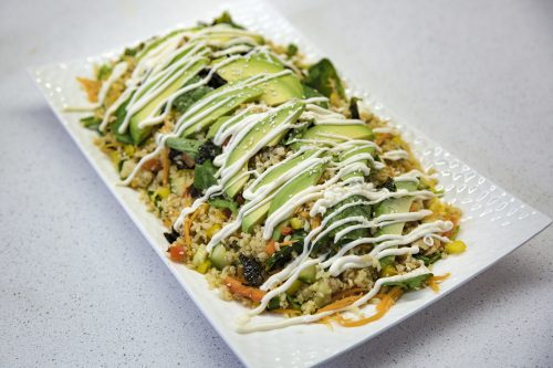 Sushi and avocado salad with garlic mayonnaise