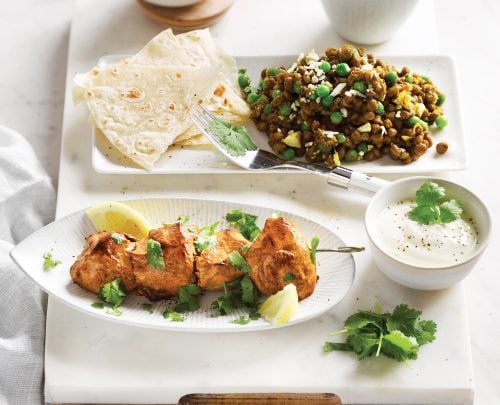 Tandoori chicken skewers with lentil, green pea and cauliflower dhal
