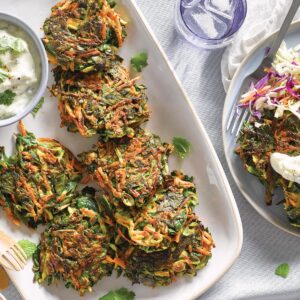 Carrot, spinach and courgette fritters with creamy feta dip
