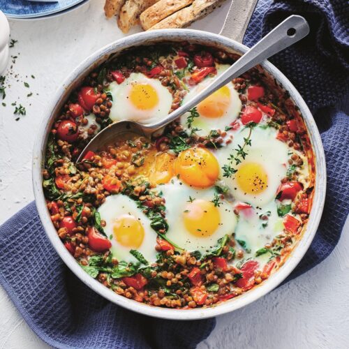 Mexican baked eggs with tomatoes and lentils