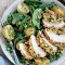 Macadamia-crusted chicken with potato salad