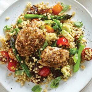 Chicken thighs with dukkah couscous salad