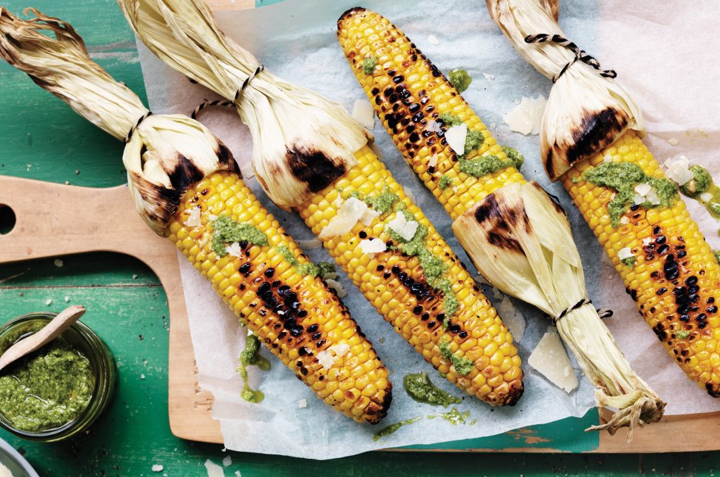 Grilled corn with pesto and parmesan Grilled corn with pesto and parmesan