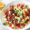 Lamb with tomato, watermelon and feta salad