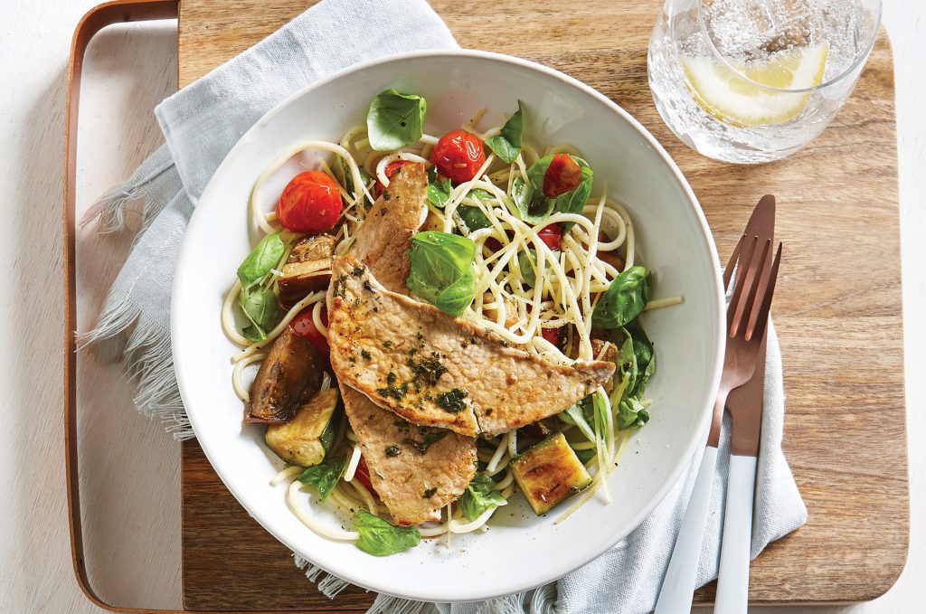 Pork schnitzel with roasted tomato pasta Pork schnitzel with roasted tomato pasta