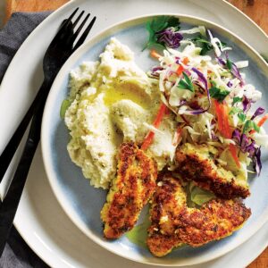 Crumbed chicken with coleslaw and cauliflower mash