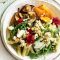 Pesto pasta salad with roasted veg and baked ricotta