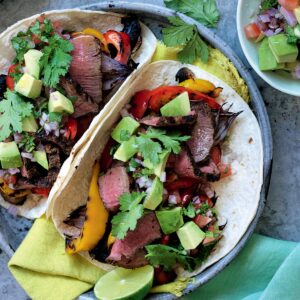 Smoky beef and vege fajitas with avocado salsa