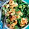 Prawns with green olives, lemon, pine nuts and watercress