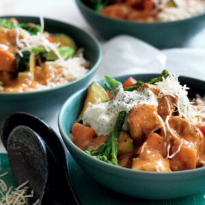 Chicken and vegetable red curry with cucumber and coconut sambal