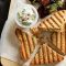 Tuna, corn and onion toasties with vege chips