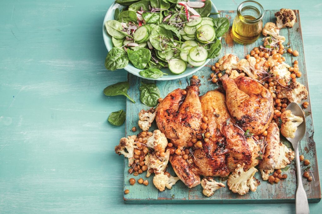 Harissa-spiced chicken with roasted cauliflower and chickpeas
