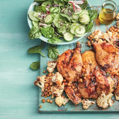 Harissa-spiced chicken with roasted cauliflower and chickpeas