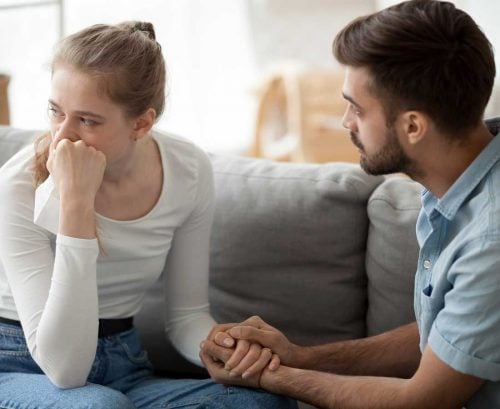 Woman venting to her supportive husband