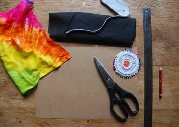 cloth, scissors, paper, ruler, pins, elastic, pencil cloth, scissors, paper, ruler, pins, elastic, pencil