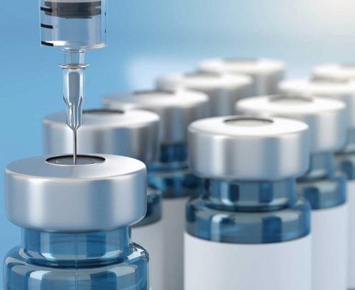 vaccine vials and syringe