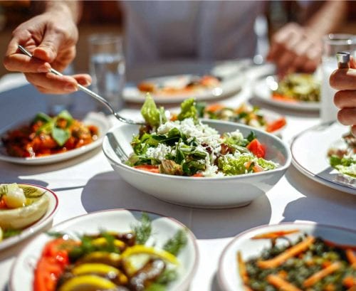 Dinner table serving a variety of dishes