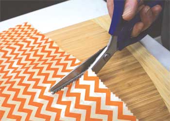 Cutting fabric with scissors Cutting fabric with scissors