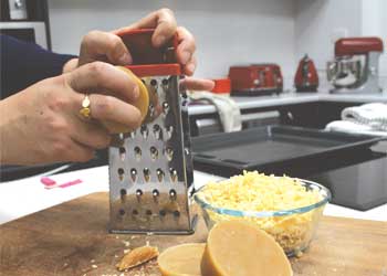 Grating beeswax Grating beeswax