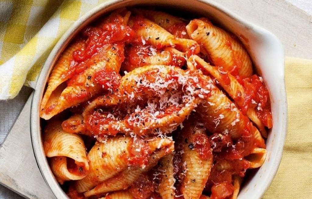 Healthier conchiglie pasta in rich tomato sauce Healthier conchiglie pasta in rich tomato sauce