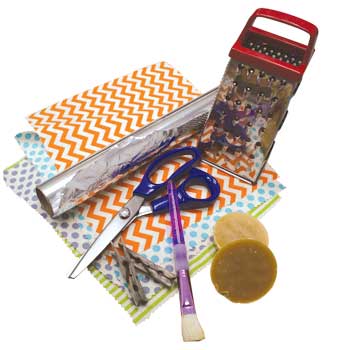 grater, fabric squares, paint brush, scissors, tin foil and beeswax grater, fabric squares, paint brush, scissors, tin foil and beeswax