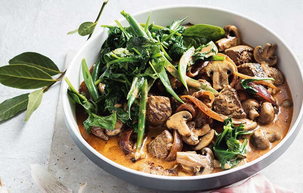 Beef and mushroom stroganoff with garlic spinach and beans Beef and mushroom stroganoff with garlic spinach and beans