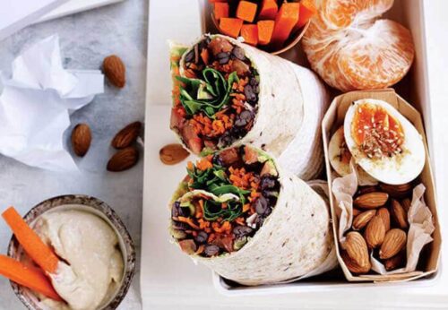 Smashed black bean, avocado and rocket wraps