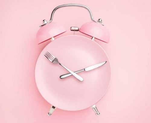 Plate clock with cutlery for hands